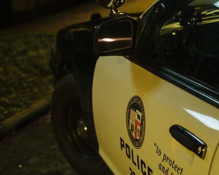 LAPD patrol car with City of Los Angeles seal at night