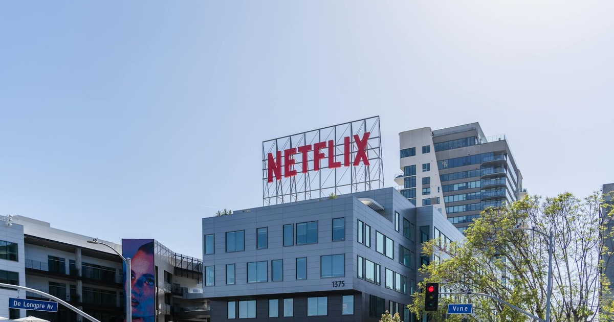 Netflix logo on a dim screen